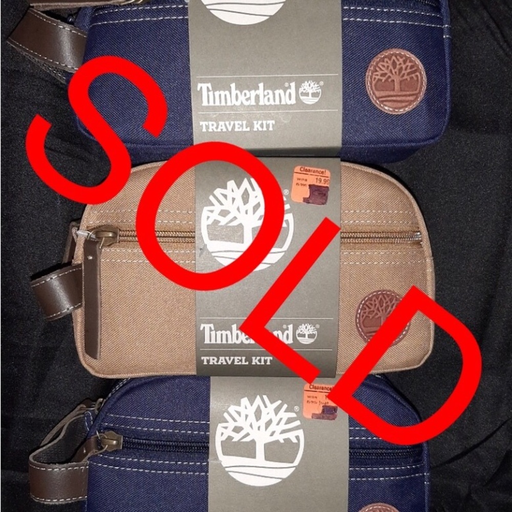 Timberland Travel Kit 2 blue Tan sold  @two Blue travel bags avaible